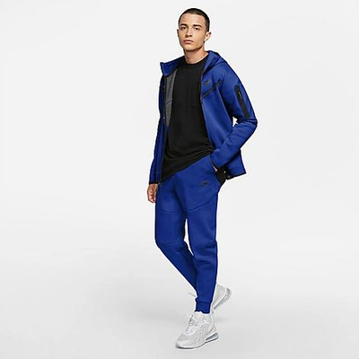 Shop Nike Tech Fleece Taped Jogger Pants In Blue