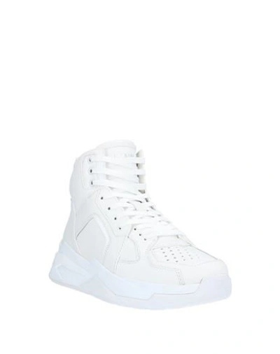 Shop Balmain Sneakers In White