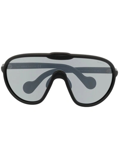 Shop Moncler Curved Visor Sunglasses In Black