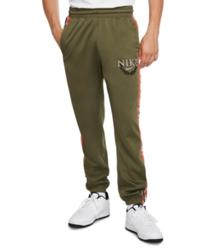 Shop Nike Men's Spotlight Basketball Pants In Olive/orange