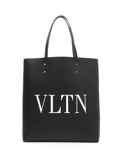 Shop Valentino Garavani Vltn Leather Tote Bag In Black White