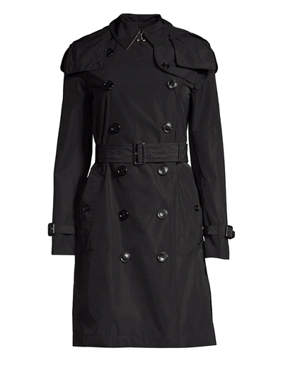 Shop Burberry Women's Kensington Hooded Double-breasted Logo Trench Coat In Black