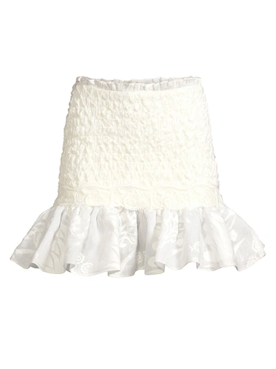 Shop Alexis Lotus Smocked Mini Skirt In White