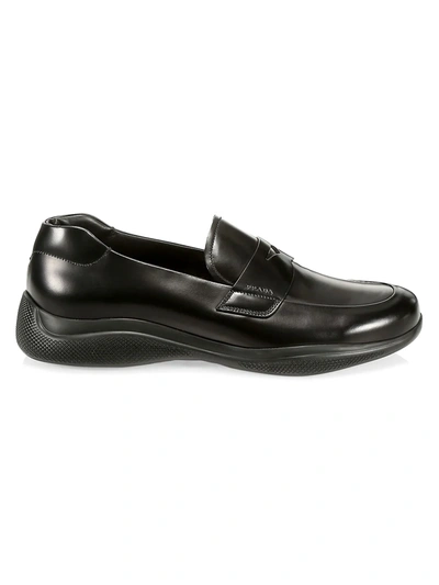 Shop Prada Spazzolato Rois Leather Penny Loafers In Black