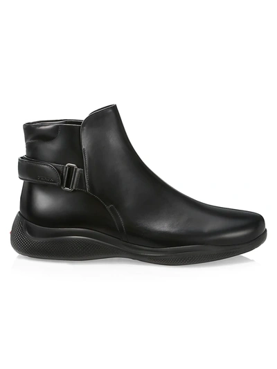 Shop Prada Brushed Leather Boots In Nero
