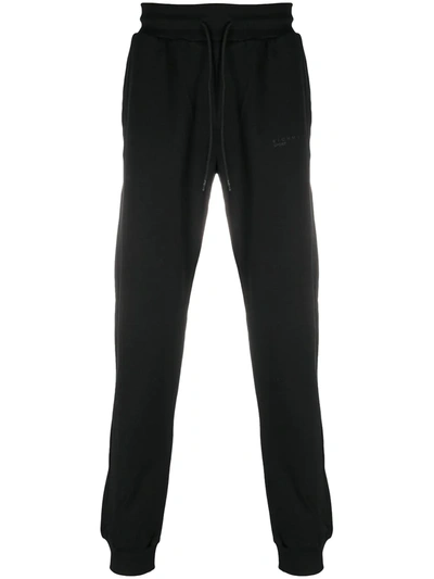 Shop John Richmond Logo Print Track Pants In Black