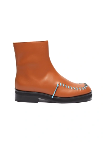Shop Jw Anderson Contrast Colour Stitch Side Zip Ankle Boots In Brown,blue