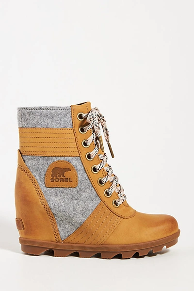 Shop Sorel Lexie Wedge Weather Boots In Yellow