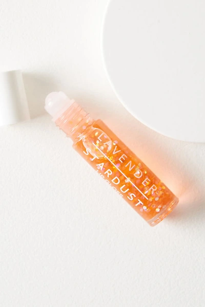 Shop Lavender Stardust Glitter Lip Gloss In Orange