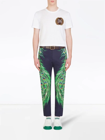 Shop Dolce & Gabbana Peacock Feather-print Trousers In Blue