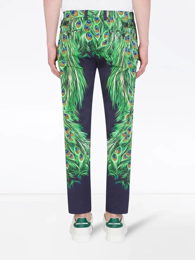 Shop Dolce & Gabbana Peacock Feather-print Trousers In Blue