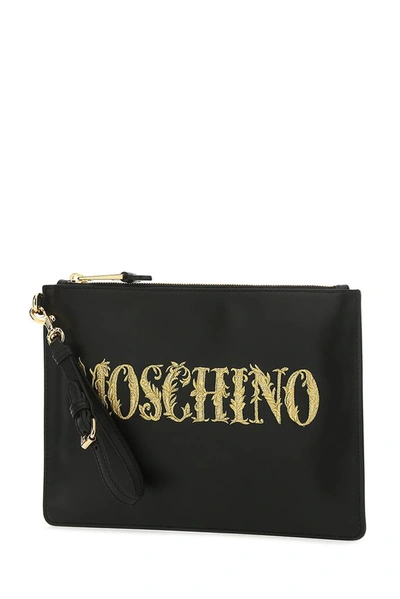 Shop Moschino Logo Embroidered Clutch Bag In Black