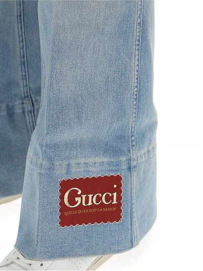 Shop Gucci Glitter Logo Patch Flared Jeans In Blue