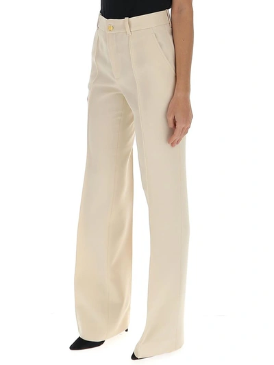 Shop Gucci High Waisted Flare Pants In Beige