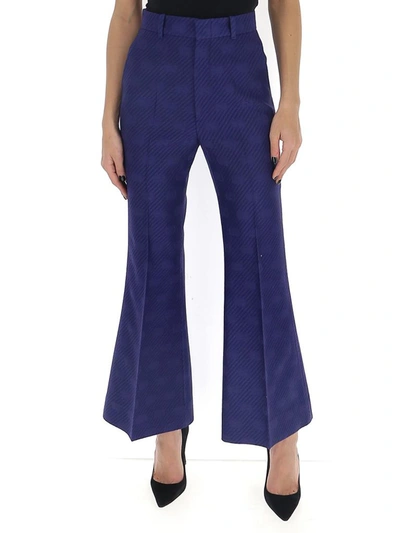 Shop Gucci Gg Diagonal Stripe Flared Trousers In Blue