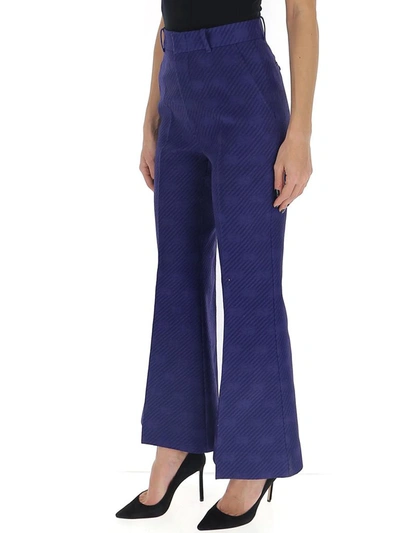 Shop Gucci Gg Diagonal Stripe Flared Trousers In Blue