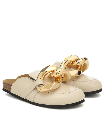 Shop Jw Anderson Embellished Leather Slippers In Yellow