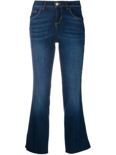 Shop Liu •jo Cropped Flare Jeans In Blue