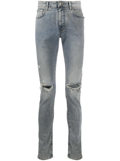 Shop Represent Ripped Knees Skinny Jeans In Blue