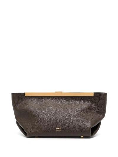 Shop Khaite The Aimee Leather Clutch Bag In Brown