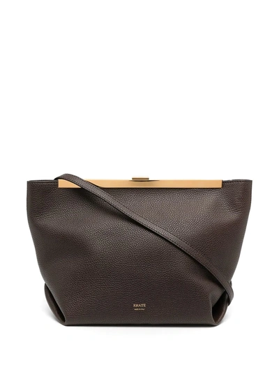 Shop Khaite The Augusta Leather Cross Body Bag In Brown