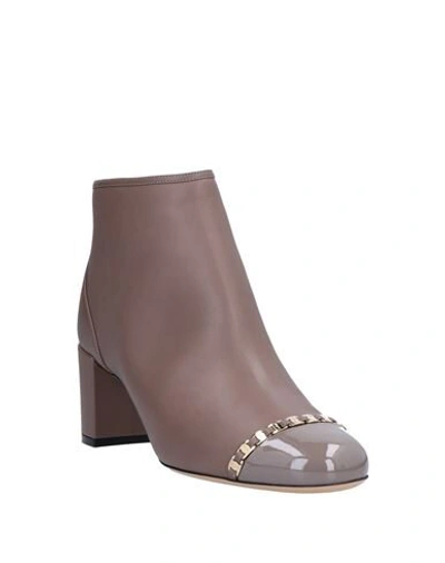 Shop Ferragamo Ankle Boots In Dove Grey