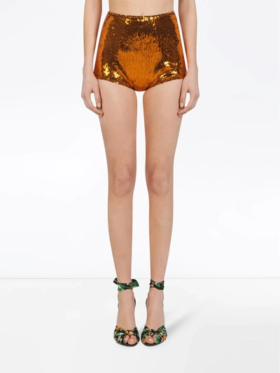 Shop Dolce & Gabbana Orange Sequin Shorts