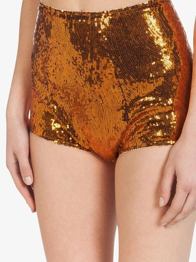 Shop Dolce & Gabbana Orange Sequin Shorts