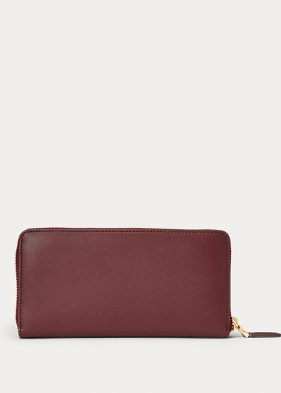 Shop Lauren Ralph Lauren Leather Continental Zip Wallet In Black/crimson
