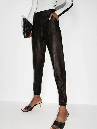 Shop Spanx Faux Leather Track Pants In Black