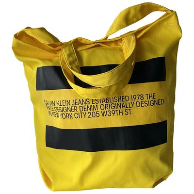 Pre-owned Calvin Klein Cloth Handbag In Yellow