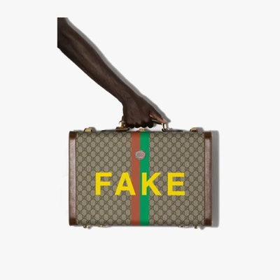 Fake supreme outlet suitcase