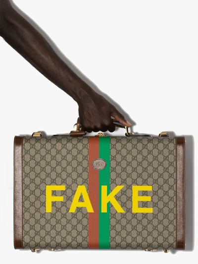 Shop Gucci Multicoloured Fake/not Gg Supreme Suitcase In Neutrals