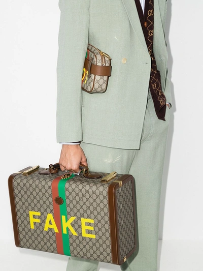 Shop Gucci Multicoloured Fake/not Gg Supreme Suitcase In Neutrals