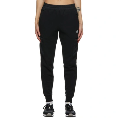 Shop New Balance Black Pocket Lounge Pants In Bk Black