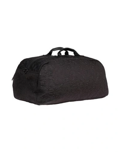 Shop Eastpak Duffel Bags In Black