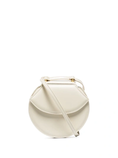 Shop Usisi Sister Henry Round Crossbody Bag In White