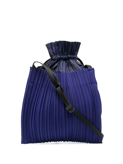 Shop Issey Miyake Pleated Drawstring Cross-body Bag In Blue
