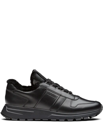 Shop Prada Panelled Low-top Sneakers In Black