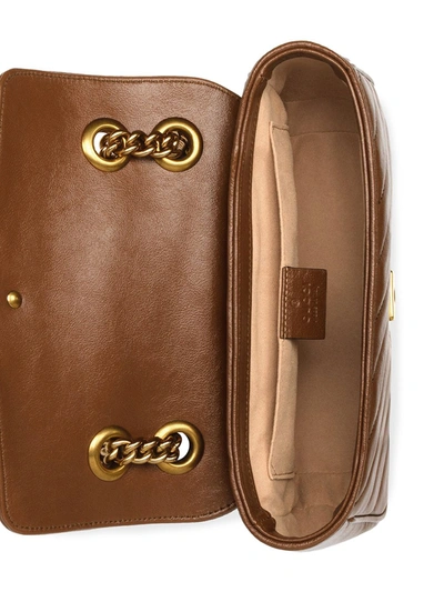 Shop Gucci Gg Marmont Mini Matelassé Shoulder Bag In Brown