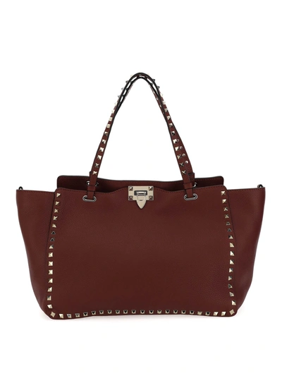 Shop Valentino Rockstud Tote Bag In Red