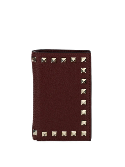 Shop Valentino Rockstud Bifold Wallet In Red