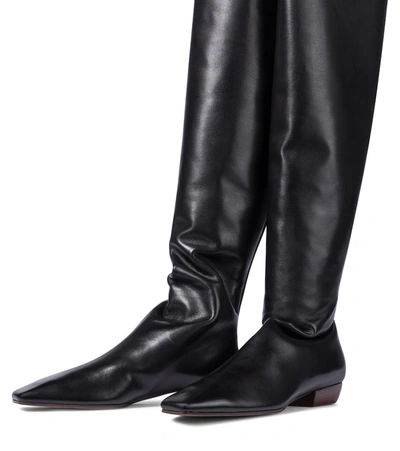 Shop The Row Slouch Leather Over-the-knee Boots In Black