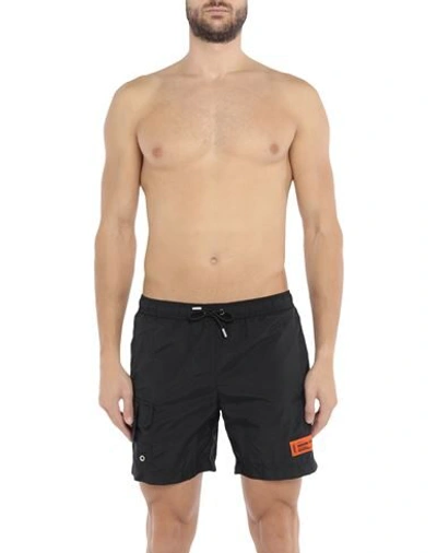 Shop Heron Preston Swim Trunks In Black