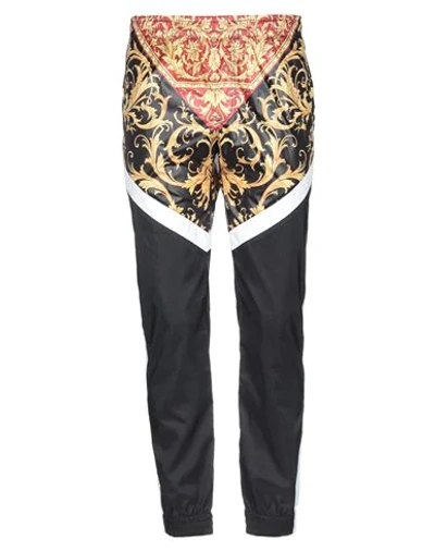 Shop Versace Pants In Black