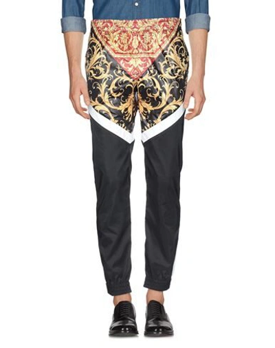 Shop Versace Pants In Black