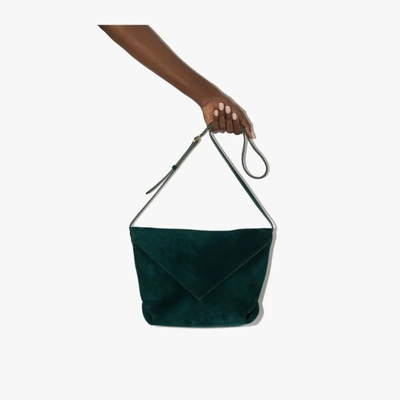 Shop Khaite X Browns 50 Green Envelope Suede Cross Body Bag