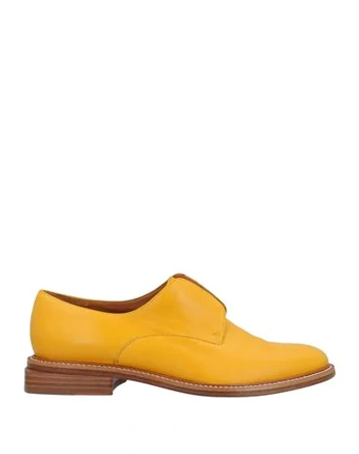 Shop Clergerie Loafers In Yellow