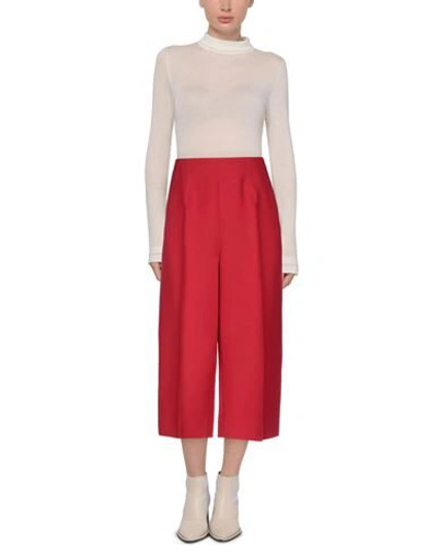 Shop Valentino Cropped Pants & Culottes In Red