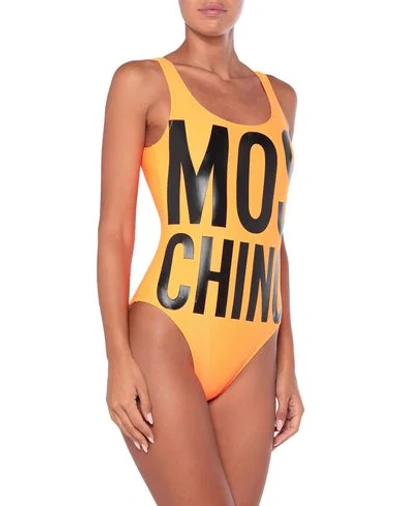 Shop Moschino One-piece Swimsuits In Orange